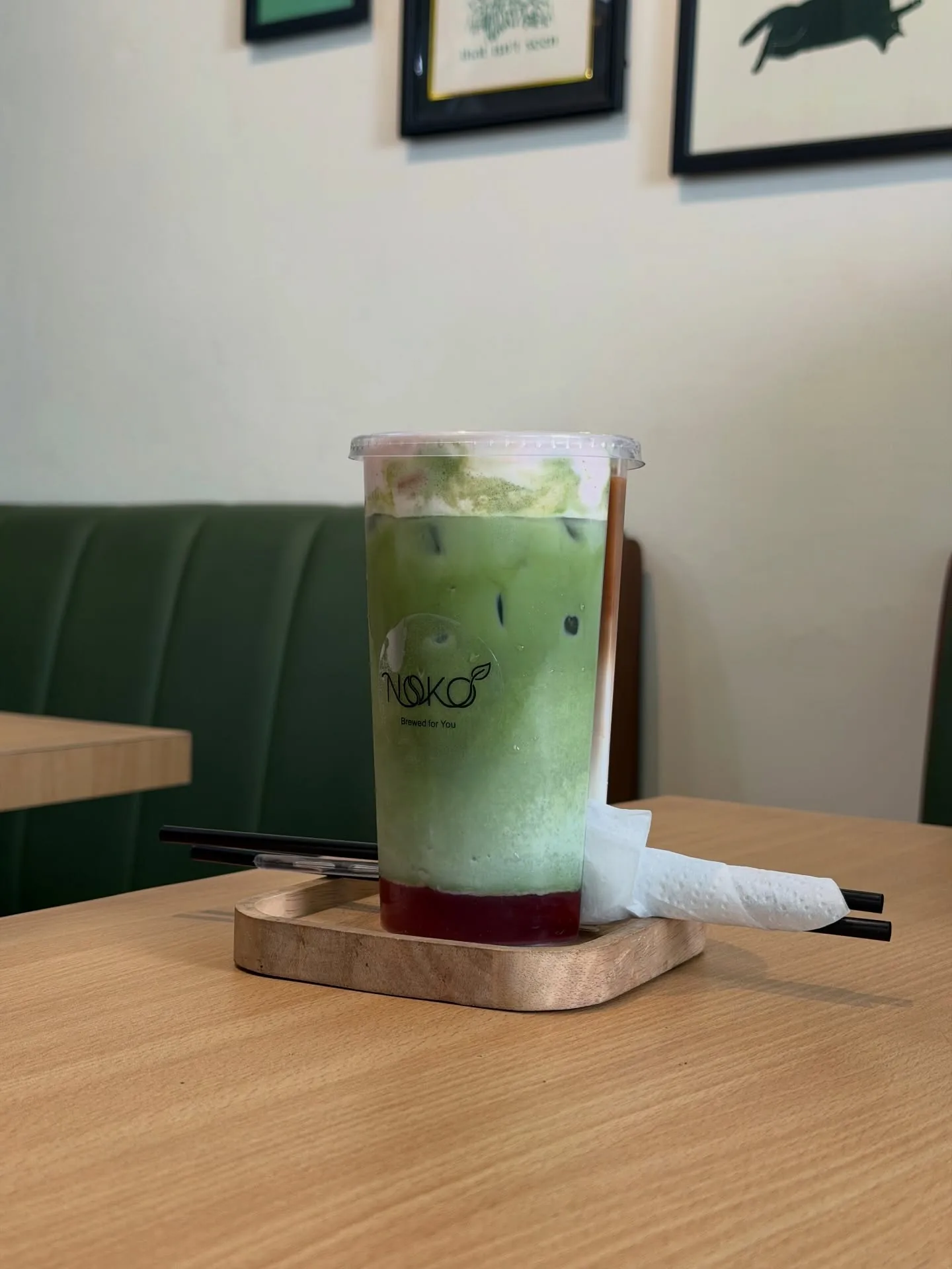 The split cup: iced latte and matcha in one cup at Noko